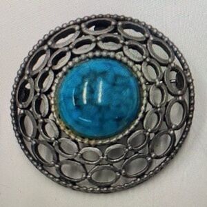 Vintage celebrity Silver and Blue Brooch